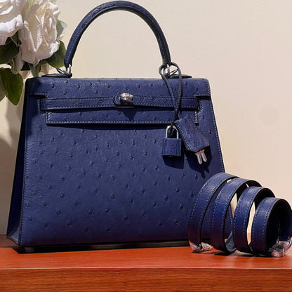 KELLY SELLIER 25 BAG IN NAVY BLUE OSTRICH LEATHER WITH SILVER HARDWARE