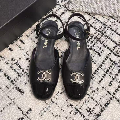 FLAT SLINGBACKS IN BLACK CALFSKIN