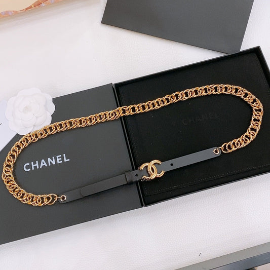 TWISTED GOLD CHAIN BELT IN GOLD METAL BLACK CALFSKIN GOLD BUCKLE