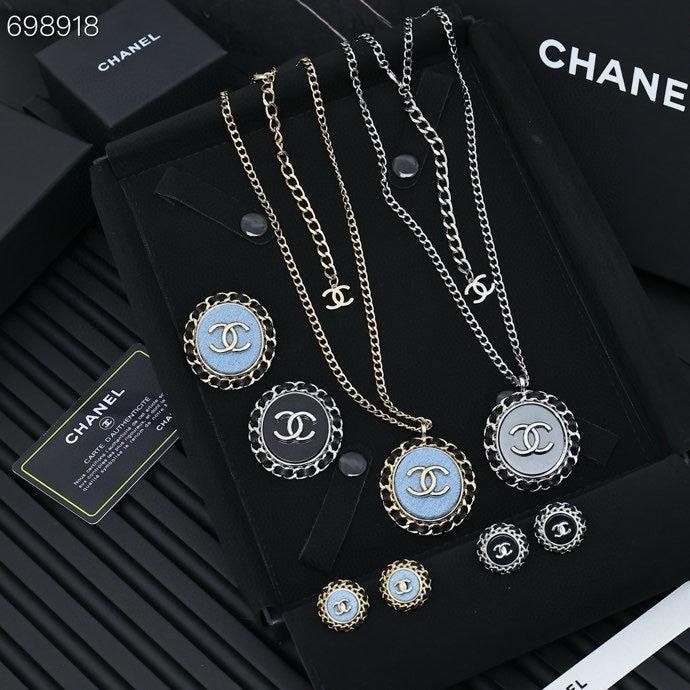 CC 25P STUD EARRINGS IN BLUE DENIM BLACK CALFSKIN-THREADED BUTTON