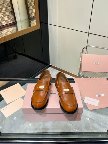 PENNY LOAFERS IN BRONZE BROWN CALFSKIN